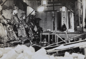 Bomb damage to figures in Longhua Temple, Shanghai, September 1937
