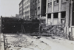 Japanese marines by a barricaded gate near Sihang godown (四行仓库), Shanghai, 1937