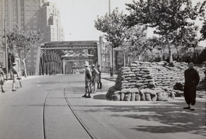 Soldiers at a sandbagged guard post, Garden Bridge, the Bund, Shanghai, 1937