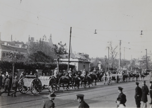 Japanese artillery units taking part in victory parade, passing the British Consulate, Shanghai, 1937