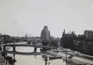 Looking down a deserted Suzhou Creek, smoke in the distance, Shanghai, 1937