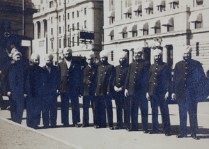 Chinese Maritime Customs Service men outside the Customs House, Shanghai