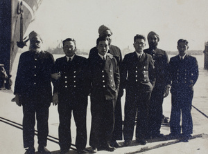 Chinese Maritime Customs Service men by the Huangpu River, Shanghai