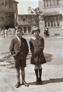 Boy and girl in school uniform