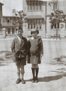 Boy and girl in school uniform