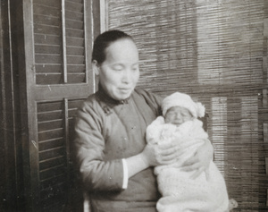 Amah with crying baby
