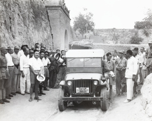 Major-General Ho, and soldiers, with SOE jeep