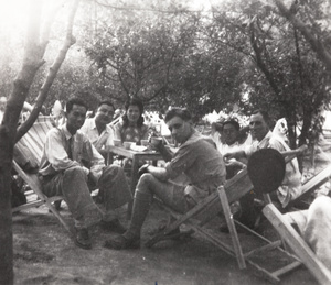 Chinese and British intelligence officers in a tea garden, Sian