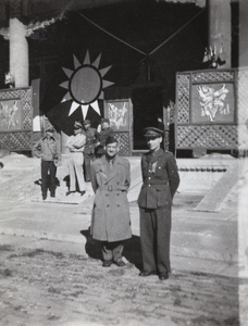 An American soldier with John E. Stanfield, at Japanese surrender, Peking