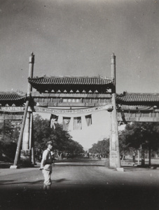 Banner on pailou welcoming allied troops to Peking, 1945