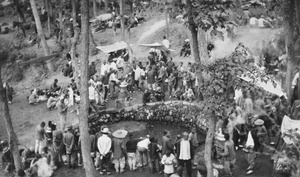 People around a pond