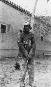 Beggar with stick