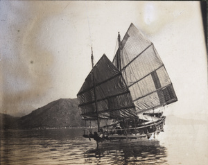 A junk in full sail, Hong Kong