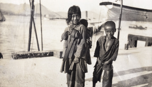 Four children on the waterfront, Hong Kong