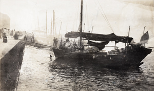 Workers unloading cargo from a boat, Hong Kong