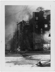 A restaurant on fire, after bombing, Chongqing