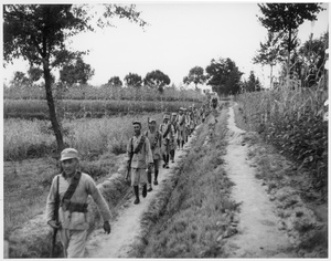 The escort for Michael Lindsay (林迈可)'s unsuccessful crossing of the Peking-Hankow railway line, beside fields