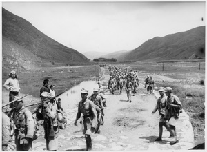 Eighth Route Army troops marching along a road, Mount Wutai area, 1938