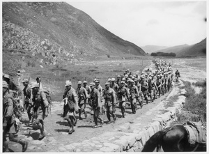 Eighth Route Army troops marching along a road, Mount Wutai area, 1938