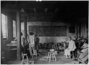 Soldiers sleeping or resting in a village school room, Central Hebei province