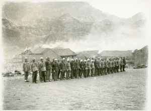 Militia on parade in a village