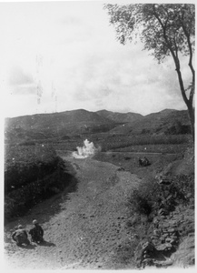 Grenade throwing practice, in a dried up river bed, Jinchaji