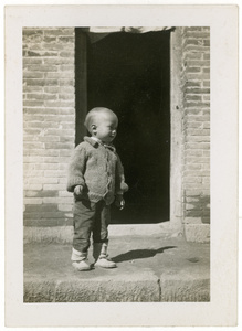 Erica Lindsay wearing a cardigan made by her mother, Yan'an (延安), 1945