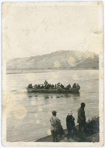 Crossing the Yellow River in a barge, 23 April 1944