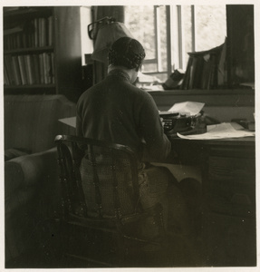 Hsiao Li Lindsay (李效黎) at a desk, typing, Yenching University (燕京大學), Beijing (北京)