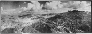 Dramatic aerial view of mountains and clouds