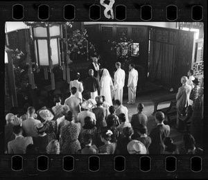 The marriage service for Michael Lindsay (李效黎) and Hsiao Li Lindsay (李效黎), led by Dr John Leighton Stuart, in the chapel at Yenching University (燕京大學), Beijing (北京)