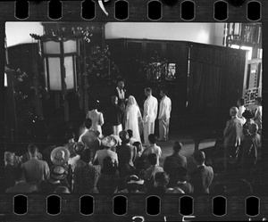 The marriage service for Michael Lindsay (李效黎) and Hsiao Li Lindsay (李效黎), led by Dr John Leighton Stuart,  in the chapel at Yenching University (燕京大學), Beijing (北京)