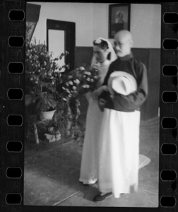 Hsiao Li Lindsay (李效黎) escorted by her father, Li Wenqi, at her wedding, Yenching University (燕京大學), Beijing (北京)