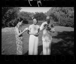 Hsiao Li Lindsay (李效黎) and Michael Lindsay (林迈可) with a guest, at their wedding party at Yenching University (燕京大學), Beijing (北京)