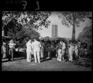 Guests at the Lindsay's wedding party at Yenching University (燕京大學), Beijing (北京), with Boya Pagoda (water tower) in the background