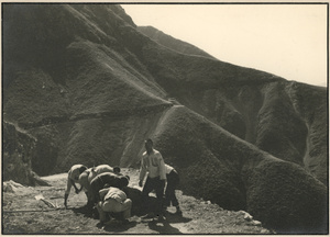 Workers making a new mountainside road, Henan