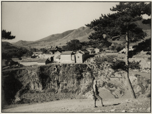 A soldier near a village, South Shanxi