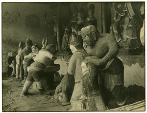 Taoist temple statues showing sinners being tortured