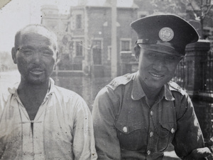 British Municipal Policeman and another man, Tianjin floods, 1938