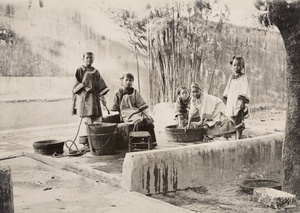 Washing laundry by a well at the Girls' School, Zhangpu