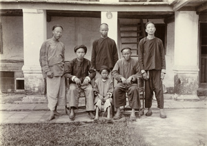 A group of five men and a boy