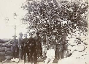 Tientsin Volunteers and a barricade on the Bund, Tianjin, during the siege, 1900