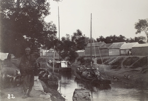 An elderly man on the bank of The Grand Canal at Jining