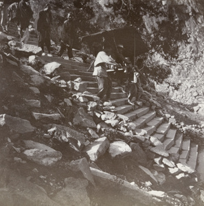 British Commissioner borne down Mount Tai 泰山, Shandong, in a litter