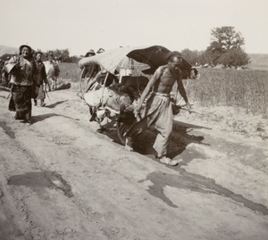 British official on a wheelbarrow, Shandong