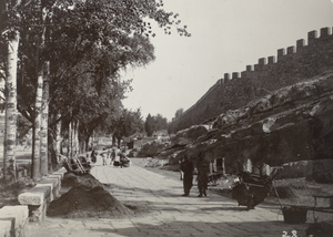 Street scene with rock formations and city wall, Boshan, Zibo