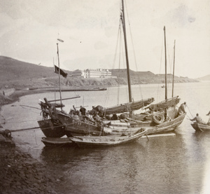 Junks moored, with King's Hotel in background, Weihaiwei