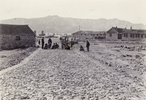 Workers by foundations of a new road, Weihaiwei