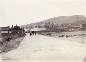 Family walking on a newly constructed road, Weihaiwei