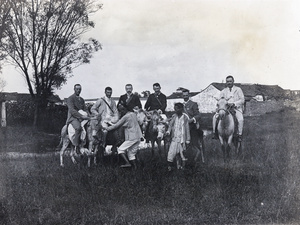 Oliver Heywood Hulme with a group on ponies